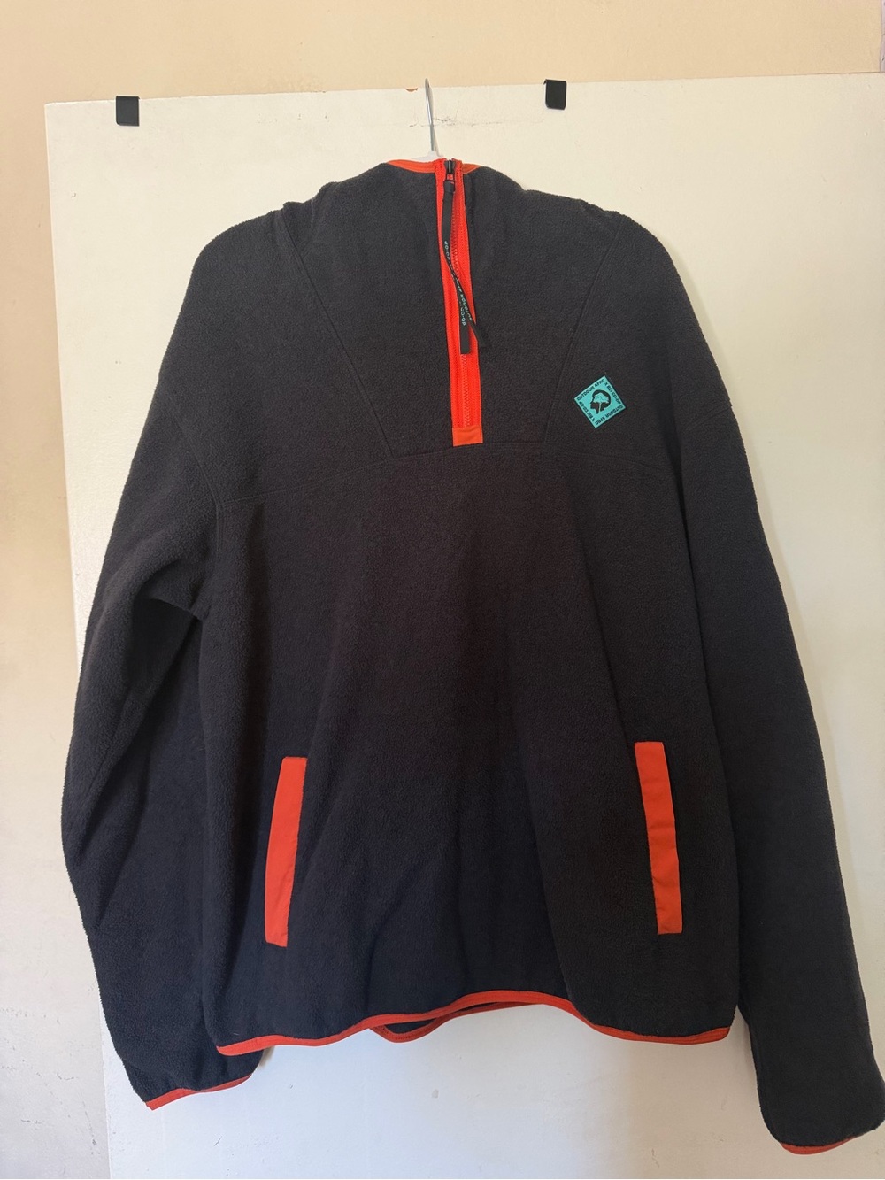 Outdoor Afro x REI Co-op collaborative fleece pullover in charcoal gray with vib